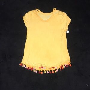 ART CLASS yellow t-shirt with tassels.